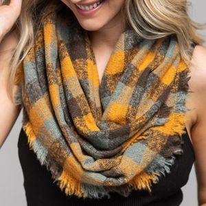 Mustard Colored plaid infinity scarf with frayed edges